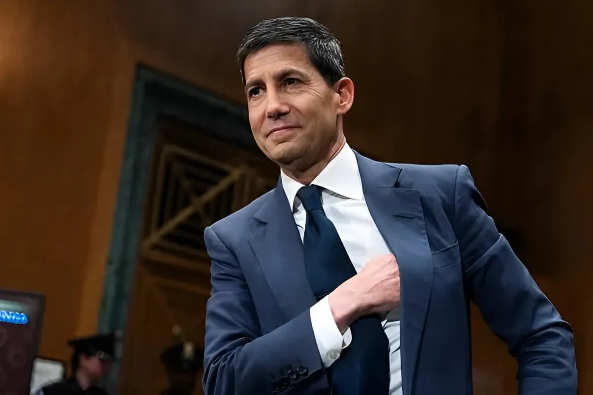 Kevin Warsh straightening his jacket as he walks through a Senate hearing room.